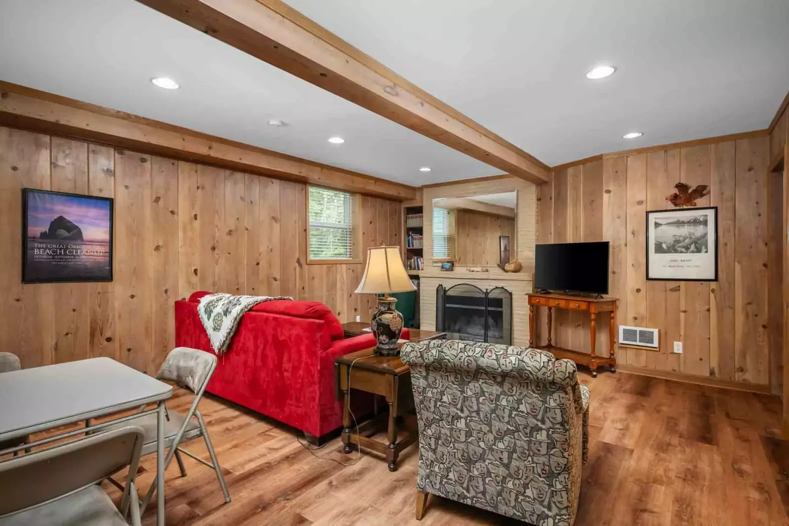 Another great room to relax in with a tv and fireplace.