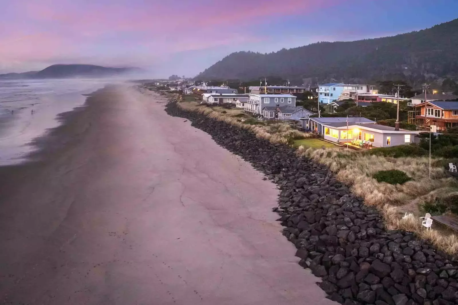 Just beyond the backyard, are miles of sandy beach, perfect for long strolls, beachcombing, and enjoying the soothing sound of the surf.