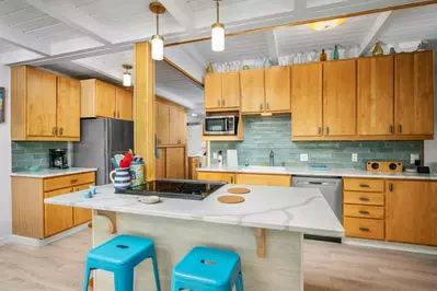 The kitchen offers plenty of space to whip up your favorite meal.