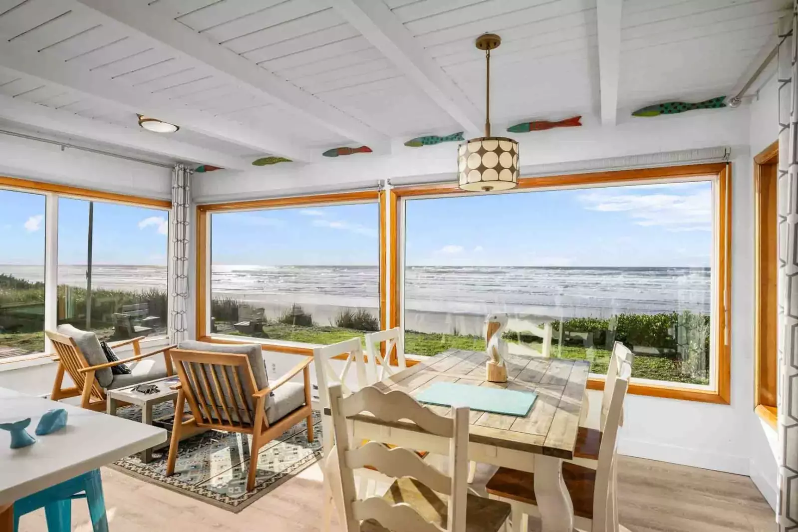 This cozy, single-level home is filled with nostalgic beach décor, creating the ideal setting to relax & escape with EPIC views of the Pacific Ocean.