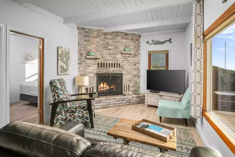 The cozy Duralog fireplace adds warmth and charm.