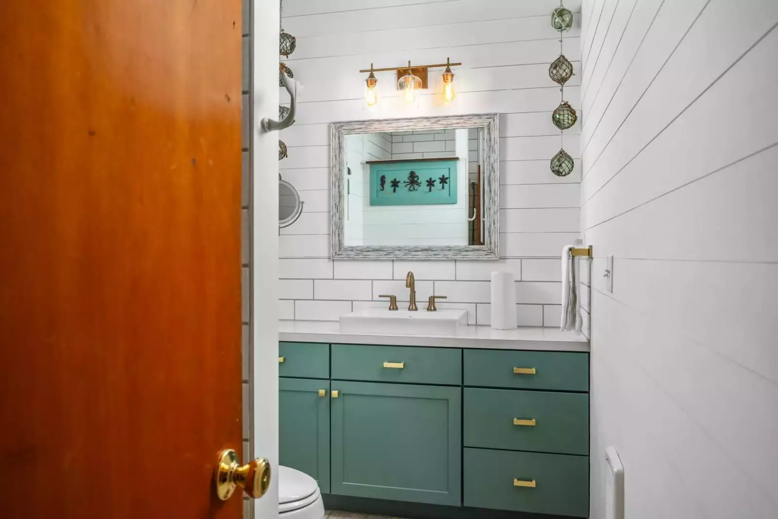 The bathroom is recently updated, has a shower with excellent water pressure, and is ornately decorated.