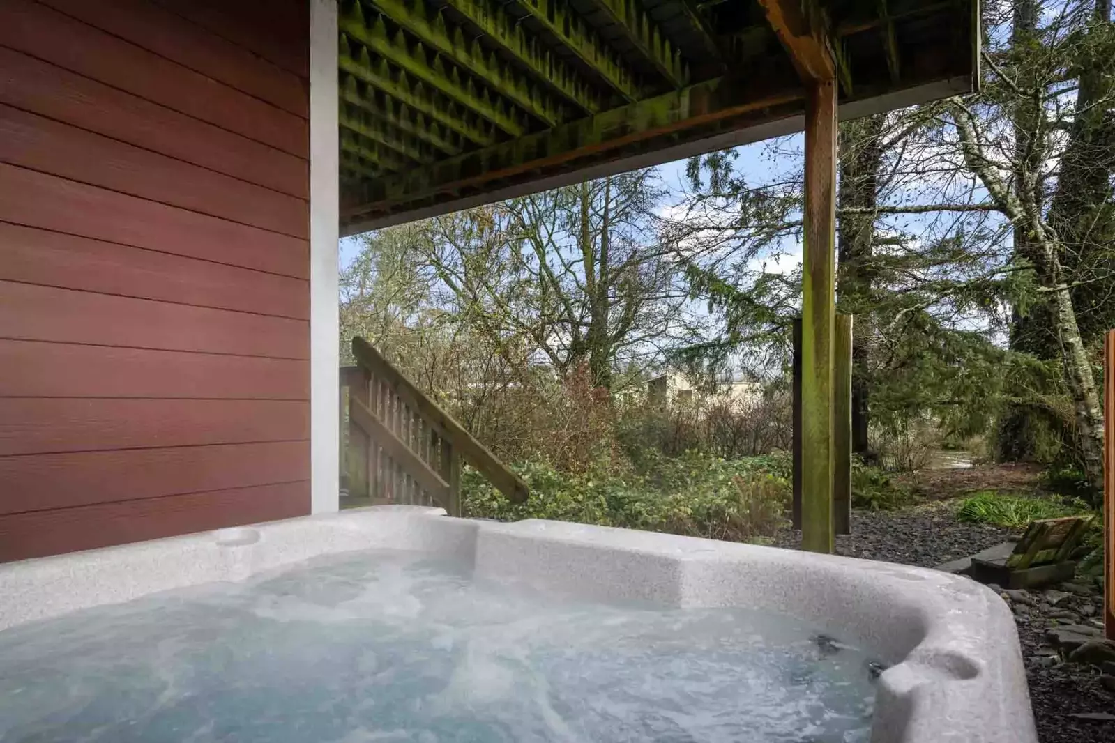 Easy access to the private outdoor hot tub.