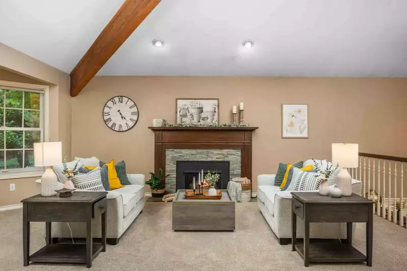 Relax in the living room in front of a cozy fire.