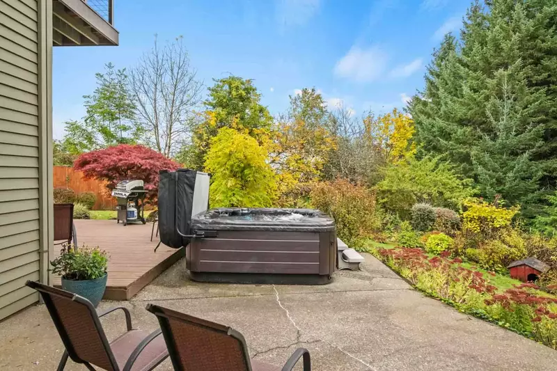 Enjoy relaxing in the hot tub while listening to wind in the trees.