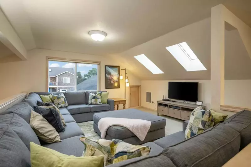 Inside, the home offers plenty of space to relax and connect with loved ones.