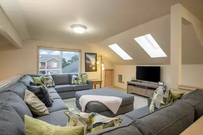 Inside, the home offers plenty of space to relax and connect with loved ones.