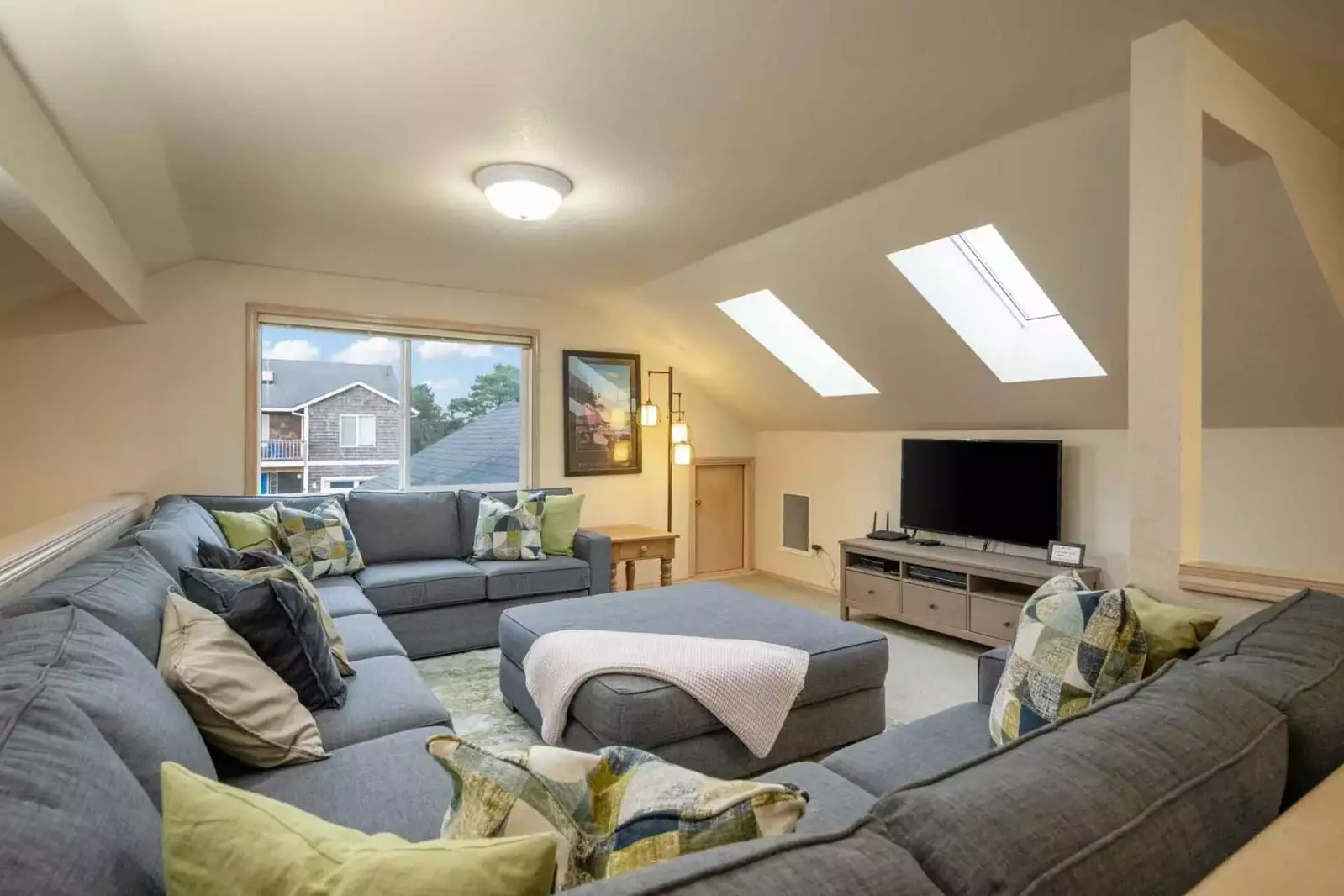 Inside, the home offers plenty of space to relax and connect with loved ones.