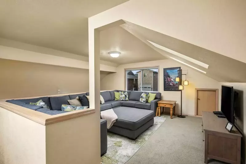 Relax in  this spacious lounge and watch your favorite shows, movies, or sports!