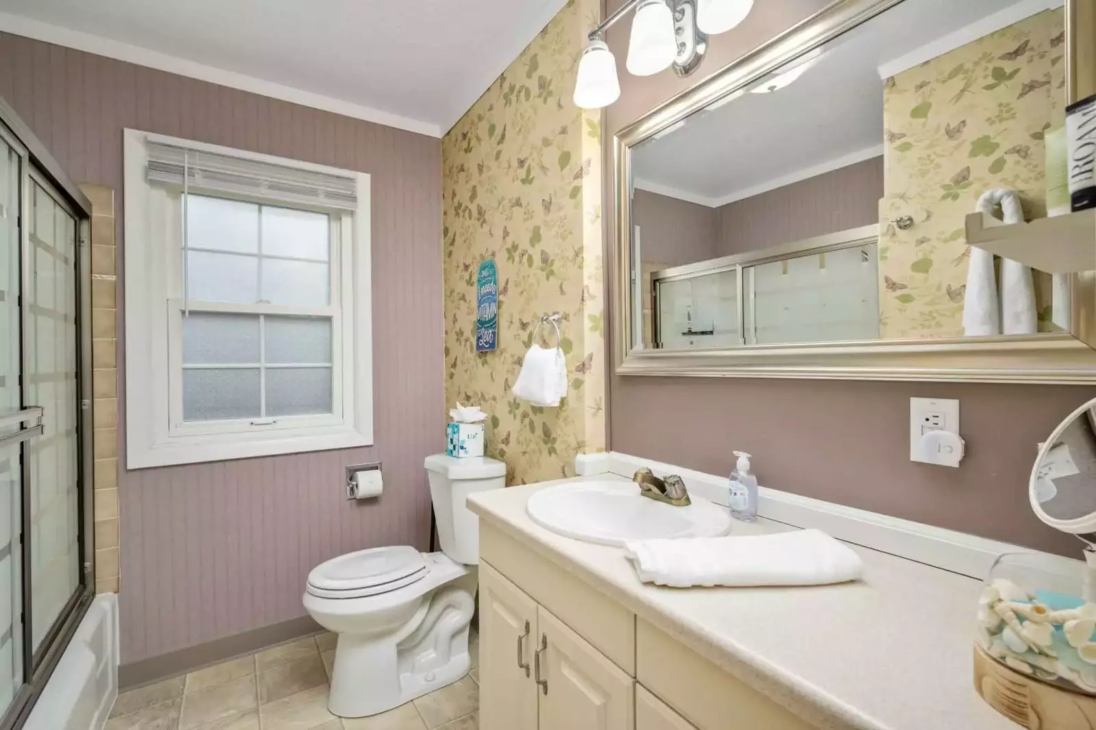 This bathroom is recently updated and built with care.