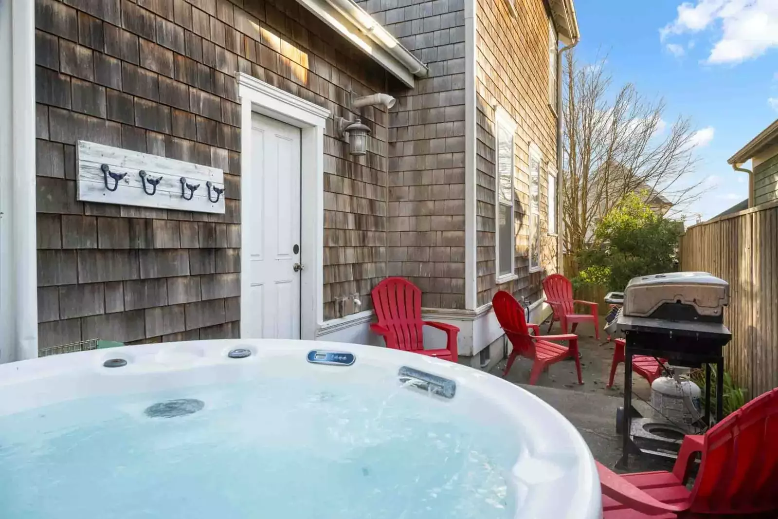 The hot tub is a favorite amenity perfect during warm summers and enchanting winters.