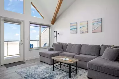 Enjoy the ocean air and view while relaxing in the living room or deck.