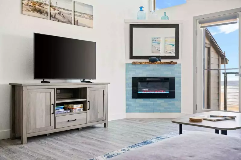 Watch you favorite movies, shows, and sports on this smart tv while relaxing in front of the cozy fireplace.