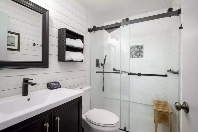 The bathroom is recently updated and ornately decorated.