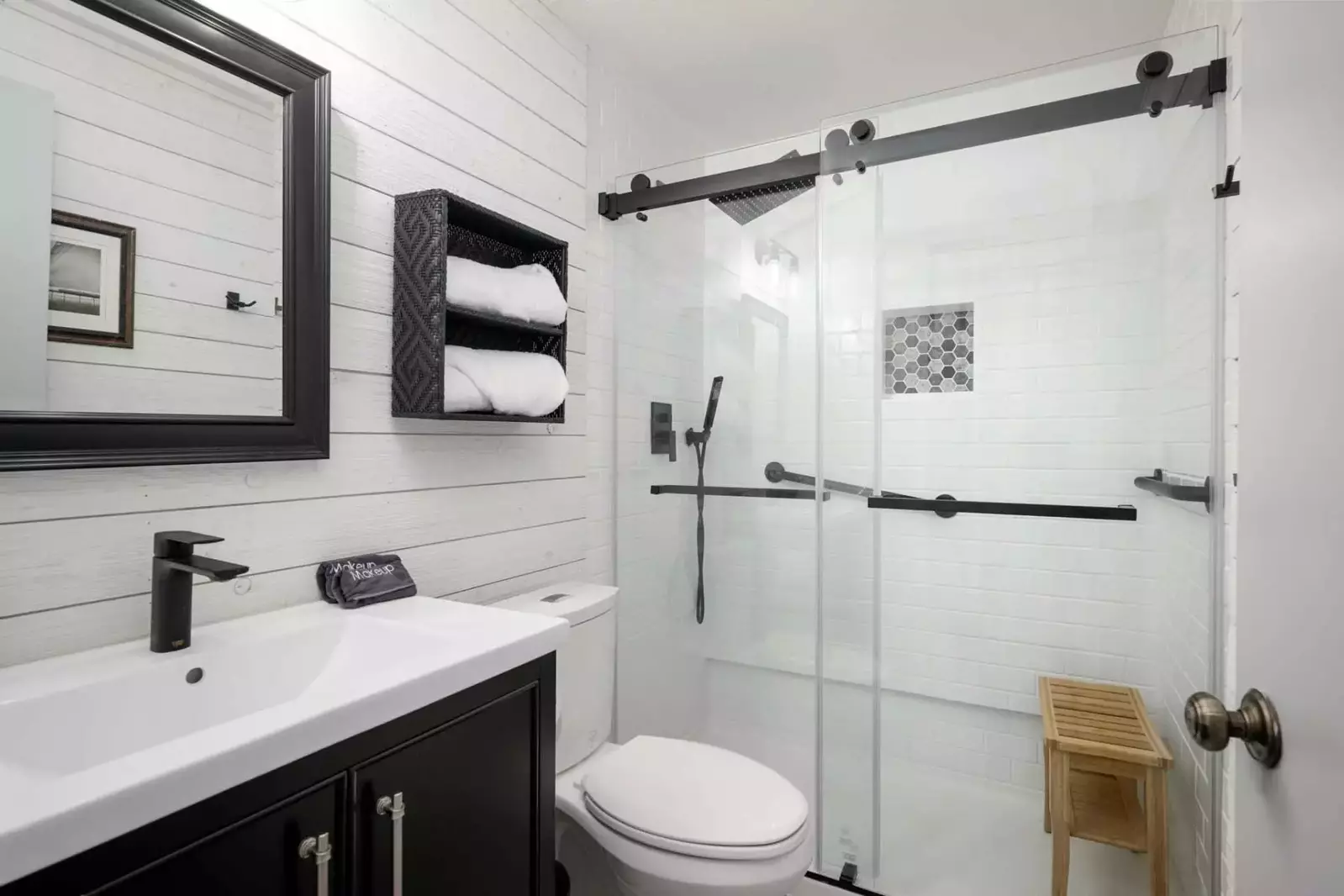 The bathroom is recently updated and ornately decorated.