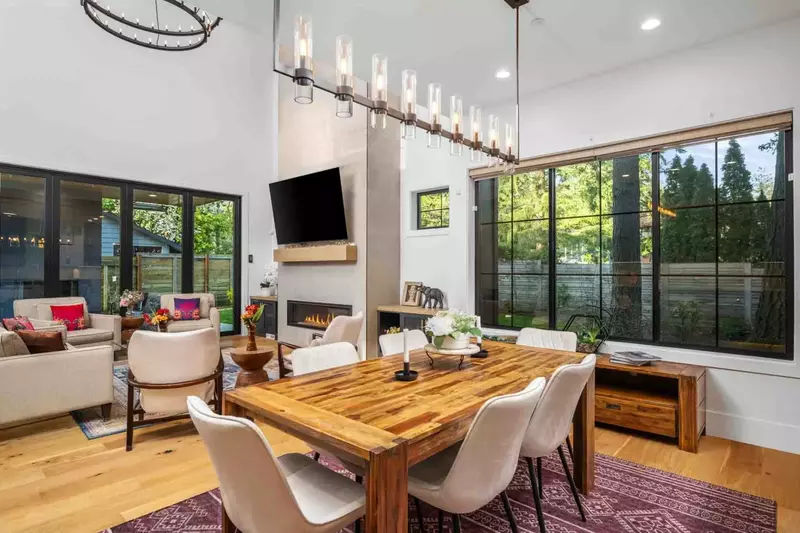 The open space kitchen, living room, and dining room allow for excellent views while preparing and enjoying dinner.