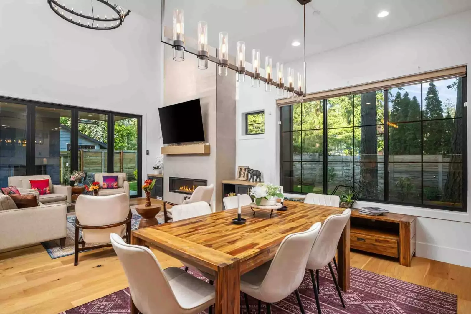 The open space kitchen, living room, and dining room allow for excellent views while preparing and enjoying dinner.