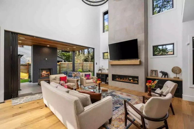 Go straight from the living room fireplace to the outdoor fireplace.