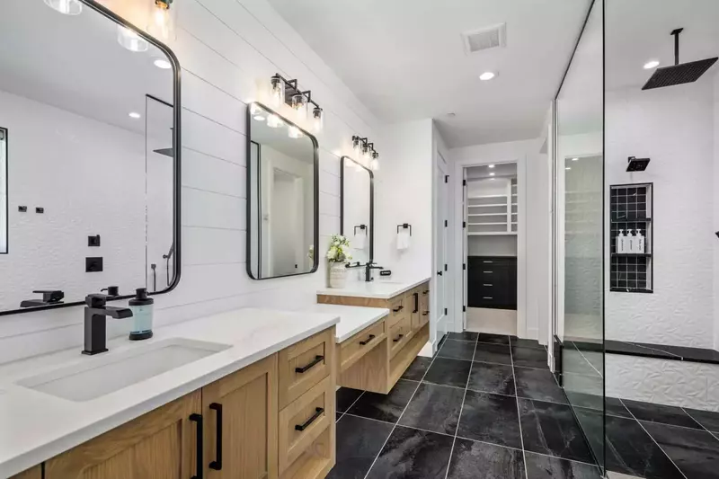This bathroom is incredibly spacious and luxurious.