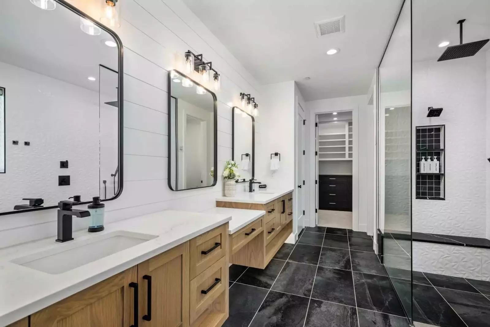 This bathroom is incredibly spacious and luxurious.