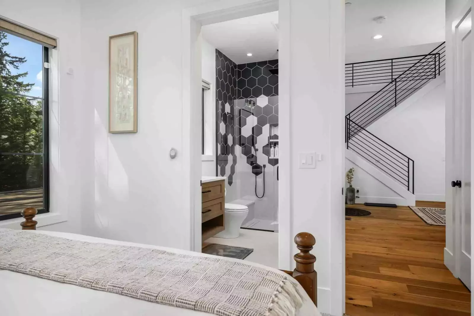 This bedroom features an en suite bathroom.