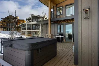 The hot tub is a favorite amenity perfect during warm summers and chilly winters.