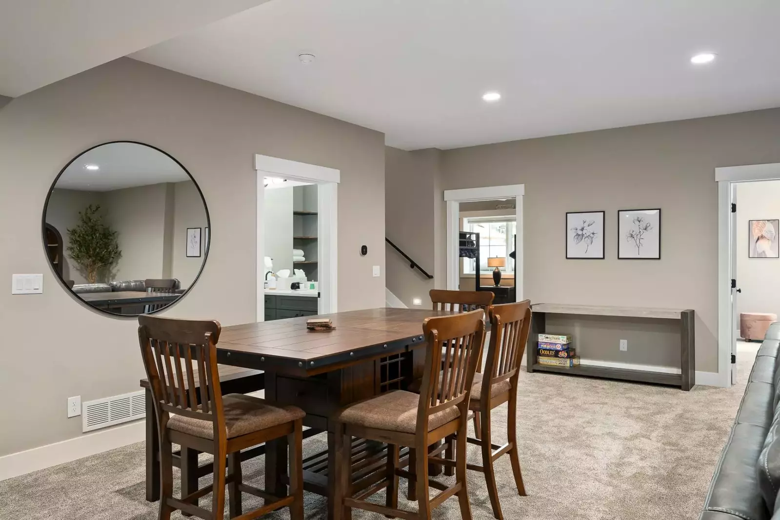 With a fireplace, ample seating, and a bar set up this room is perfect for a game night!