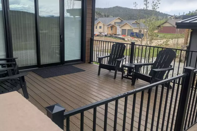 Sitting area off the master bedroom with Adirondack chairs.