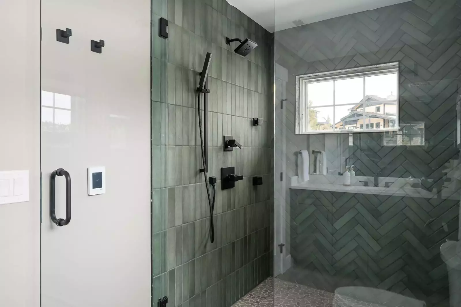 Another bathroom featuring a spacious shower with robust water pressure.
