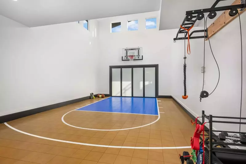 Play a game in the indoor half basketball court!
