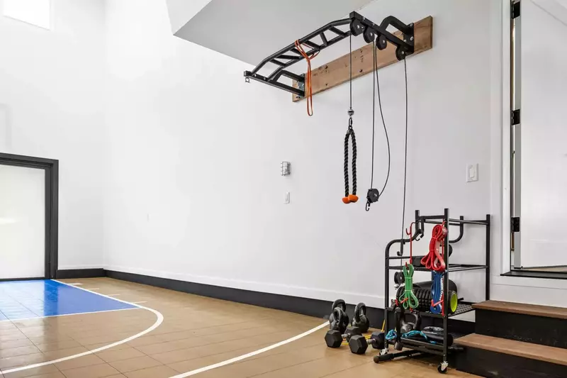 The basketball court comes with ample exercise equipment.