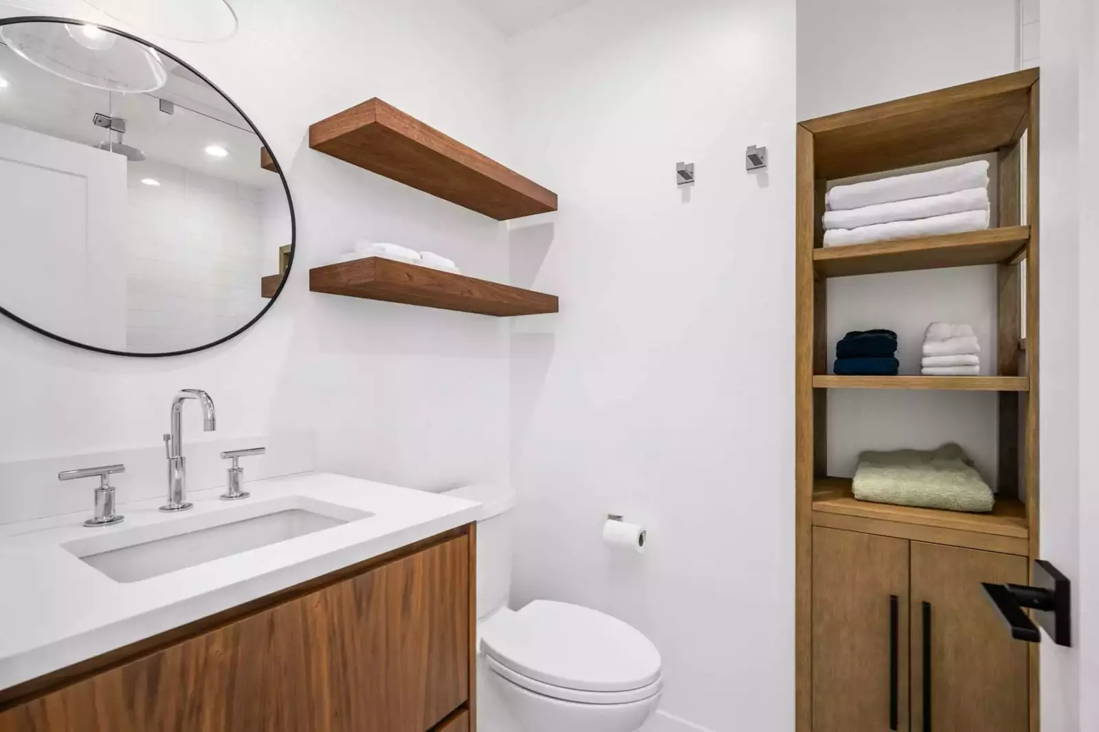 The bathroom is recently updated and ornately decorated.