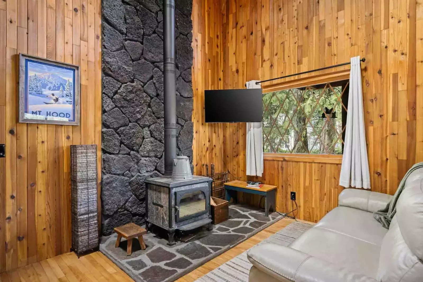 Relax in the living room in front of a cozy fire.