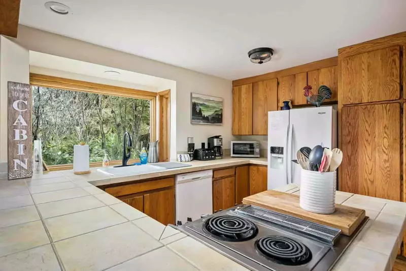 The kitchen is spacious and efficient. Perfect place to prepare a family meal.