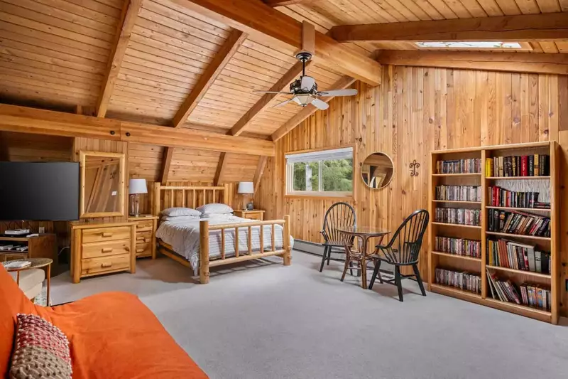 The upstairs bedroom has a massive  home video selection. Perfect place for a movie night.