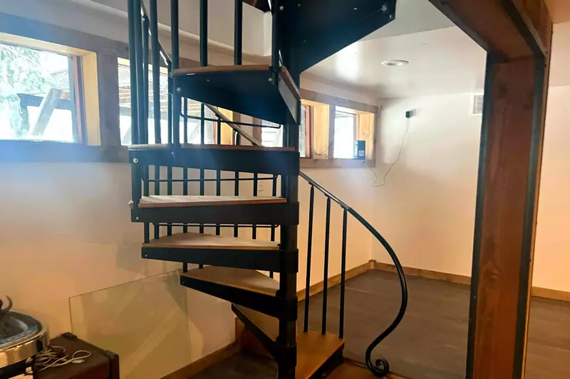 The spiral staircase is another feature that makes this property magical.