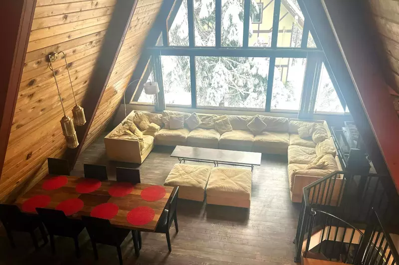 The living room is an open common area perfect for relaxing and recharging after a day of adventures.