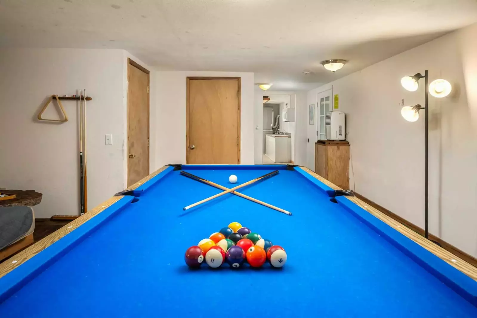 The game room has a pool table.