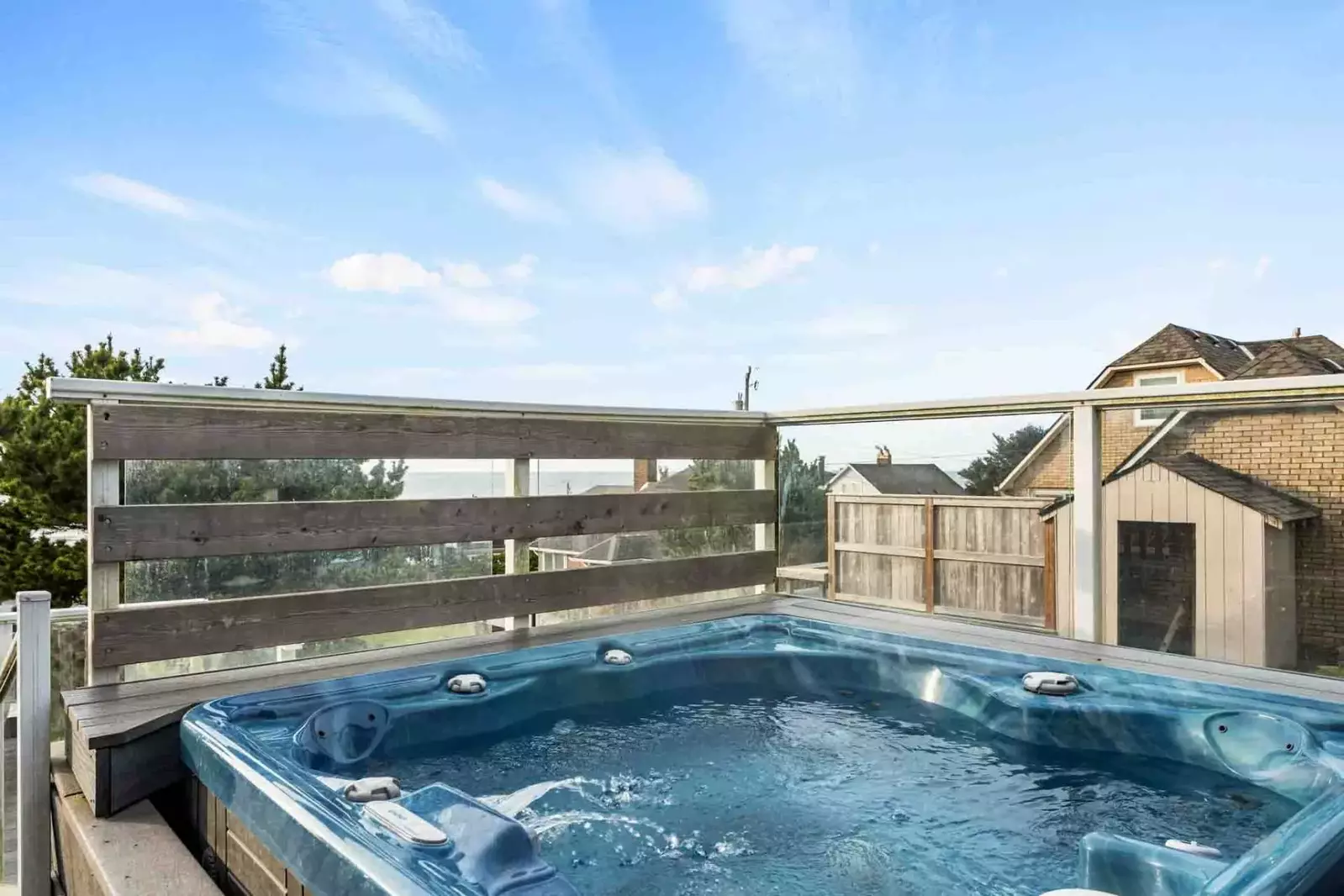 The hot tub is another excellent spot to relax and enjoy this coastal paradise.