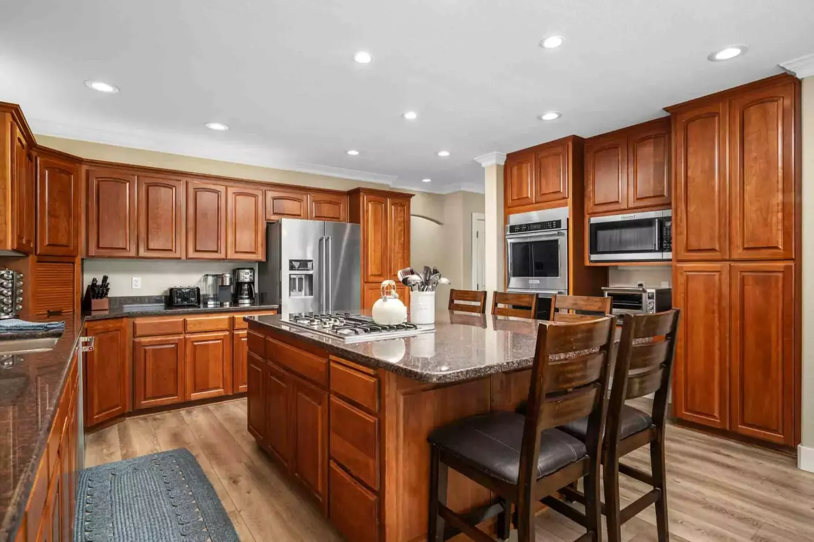 The kitchen has ample counter space and state of the art appliances.