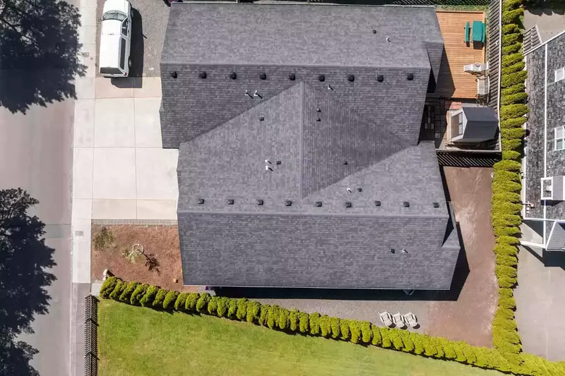 Backyard area line with trees (not fully fenced)