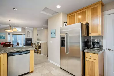 The kitchen has ample space and up to date appliances.