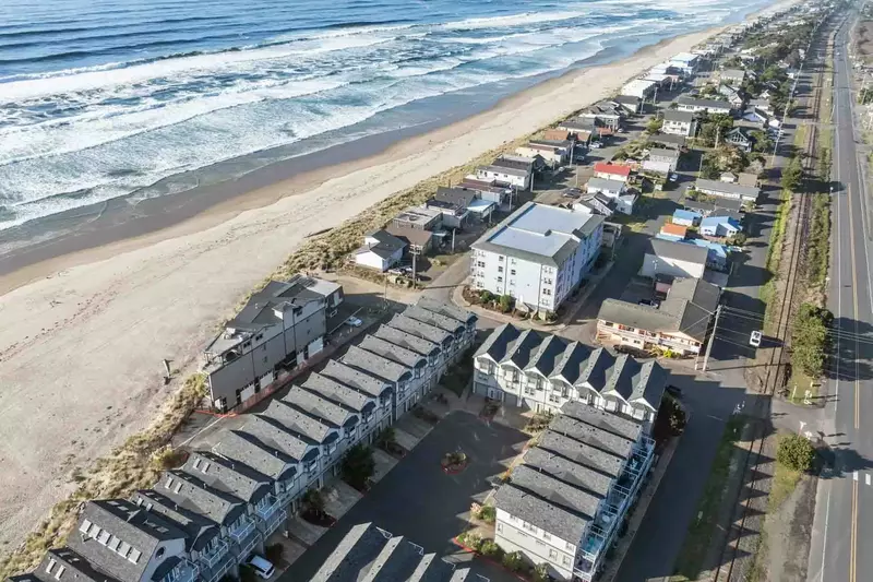 Rockaway Beach is beloved for it's vast sandy beach and iconic Twin Rocks.