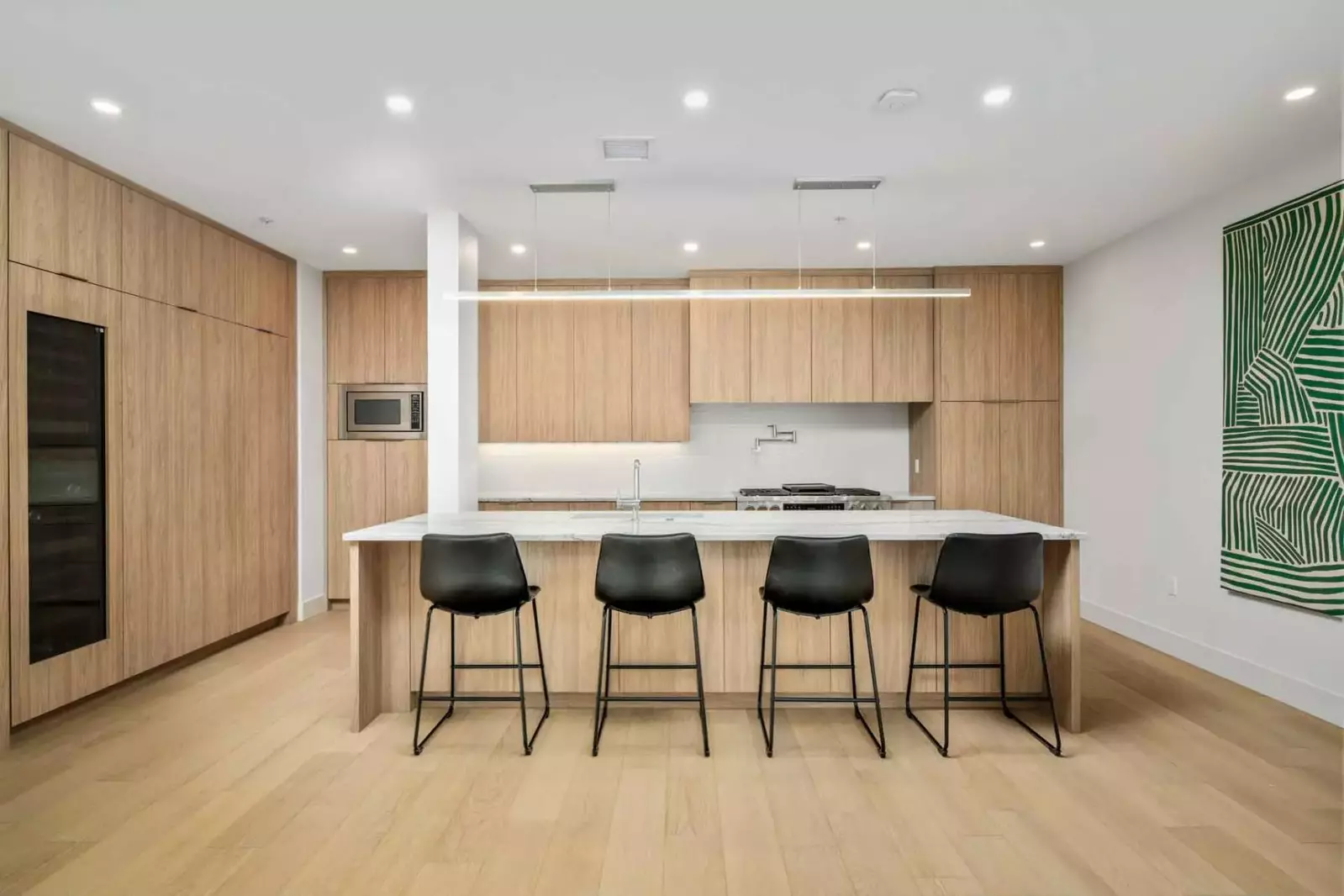 The kitchen has ample counter space and up to date appliances.