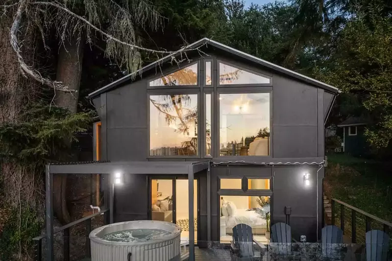Guests can soak in the hot tub on the deck as they enjoy the view.
