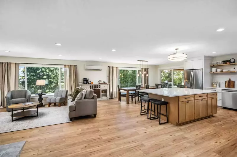 Picture windows throughout the open floorplan offer tons of natural light and vineyard views.