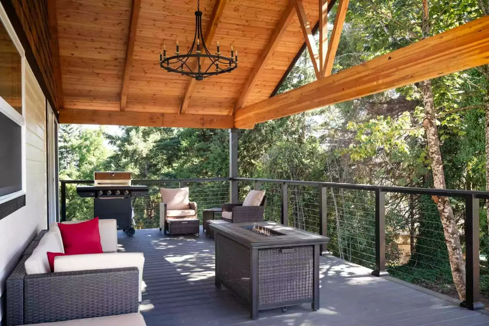 Lounge furniture along with a fire pit create a serene environment to unwind.