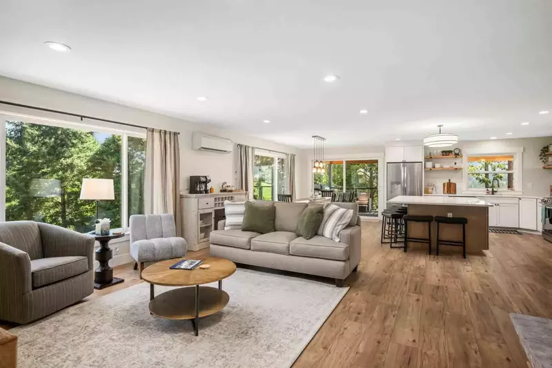 Open concept great room that opens to large Vineyard facing covered deck.