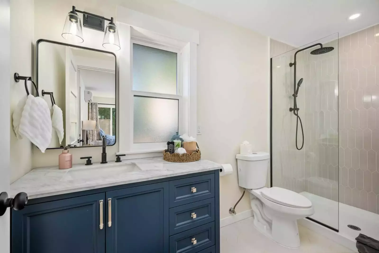 Large tile shower found in the lower floor en suite