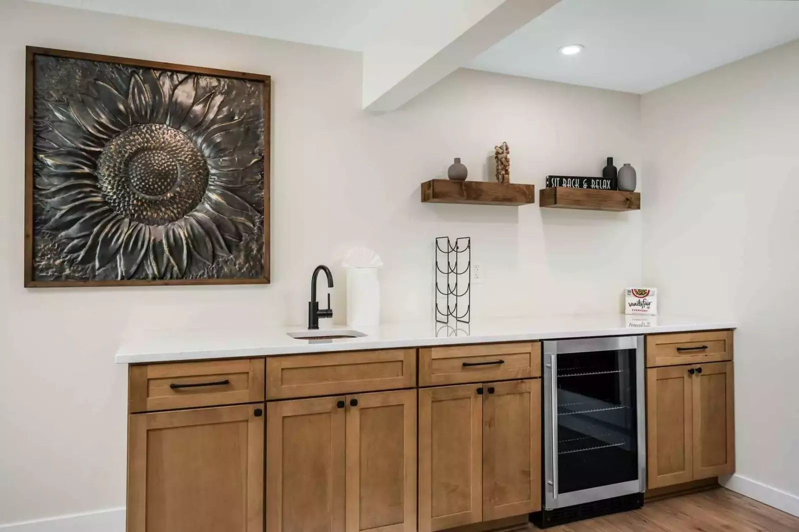 Downstairs offer a wet bar with wine cooler.